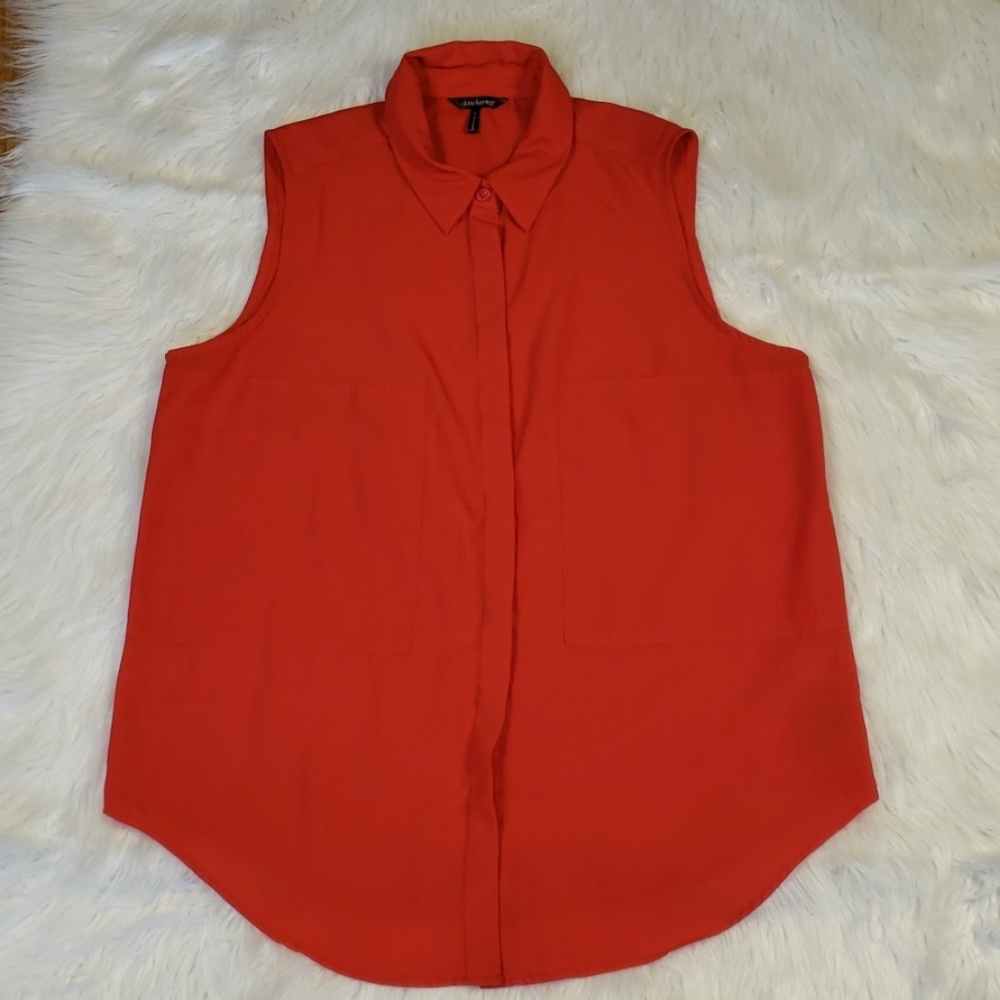 Bright red sleeveless top